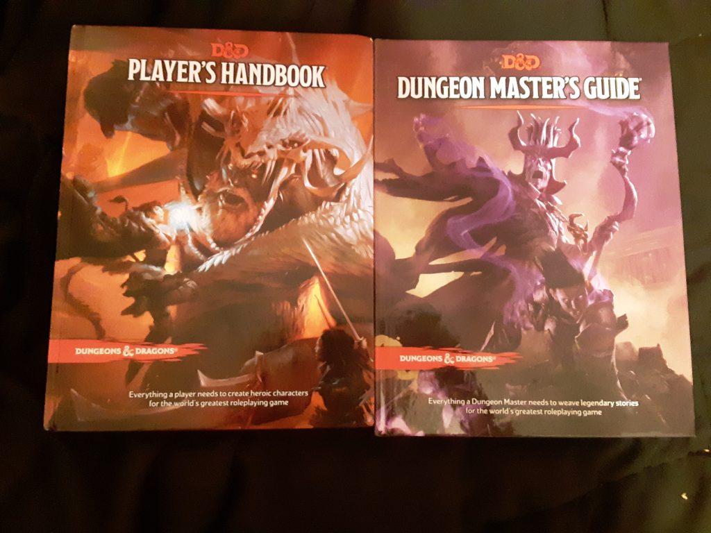 The D&D 5th edition Player's Handbook and the D&D 5th edition Dungeon Master's Guide.